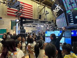 Children on the trading floor of the New York Stock Exchange