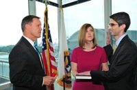 Troy Paredes (right) is sworn in as SEC Commissioner