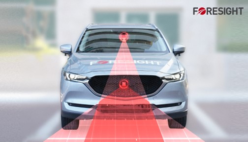 A car with a red light

Description automatically generated