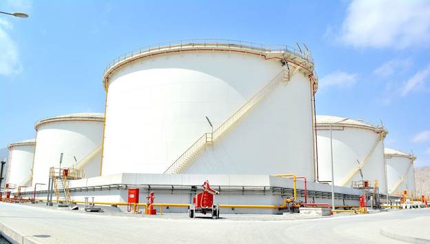 A picture containing sky, outdoor, building, storage tank

Description automatically generated