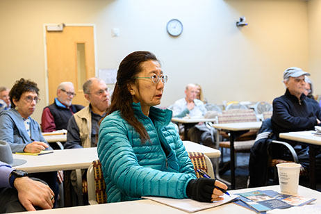 audience member listening to the presentation at an elder outreach event in Los Angeles in Jan 2020
